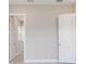 Spacious bedroom with bright doorway and windows at 26908 Victoria Pl, Punta Gorda, FL 33955