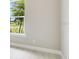 Bright bedroom showcases a large window providing lots of natural light and a beautiful view at 26908 Victoria Pl, Punta Gorda, FL 33955