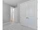 Bedroom with plush carpet, a closet, and neutral walls at 26930 Lark Ct, Punta Gorda, FL 33955