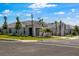 Street view of a single-story home with well-maintained landscaping at 26930 Lark Ct, Punta Gorda, FL 33955