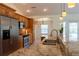 Modern kitchen featuring stainless steel appliances and granite countertops at 3739 Kingston Blvd, Sarasota, FL 34238