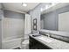 Comfortable full bathroom featuring a shower-tub combo, toilet, and vanity with good lighting at 406 116Th E St, Bradenton, FL 34212