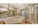 Spacious bathroom featuring an integrated countertop sink and walk-in shower at 4473 Gulf Of Mexico Dr, Longboat Key, FL 34228