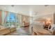 Bright main bedroom with balcony access and ocean view at 4473 Gulf Of Mexico Dr, Longboat Key, FL 34228