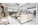 Open concept living space featuring living room, dining area, and modern kitchen at 4721 Mainsail Drive, Bradenton, FL 34208