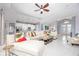 Open-concept living space filled with natural light, connecting living room to dining and kitchen at 4721 Mainsail Drive, Bradenton, FL 34208