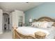 Tranquil main bedroom with decorative bed frame and neutral decor at 4721 Mainsail Drive, Bradenton, FL 34208