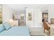 Main bedroom with an ensuite bathroom, featuring a comfortable bed, and stylish vanity at 6650 Schooner Bay Cir # 6650, Sarasota, FL 34231