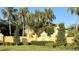 Eagle Isle community entrance featuring lush landscaping and decorative signage at 6768 Breezy Palm Dr, Riverview, FL 33578