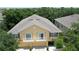 Charming two-story home featuring dual balconies, a two-car garage, and a beautifully landscaped yard at 6768 Breezy Palm Dr, Riverview, FL 33578