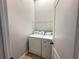 Laundry room featuring a standard washer and dryer at 6768 Breezy Palm Dr, Riverview, FL 33578
