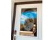 Elegant front door with a decorative heron etching and secure digital lock at 7076 Nichols St, Englewood, FL 34224