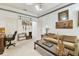 Cozy living room features comfortable seating, a desk, and stylish decor at 9142 16Th Avenue Nw Cir, Bradenton, FL 34209