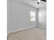 A blank canvas awaits in this bedroom with a ceiling fan and big window, perfect for your personal touch at 13303 Swiftwater Way, Lakewood Ranch, FL 34211