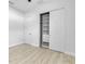 Modern bedroom with built-in wardrobe, neutral decor, and ample space at 13303 Swiftwater Way, Lakewood Ranch, FL 34211