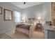 Cozy bedroom with a comfortable bed, soft lighting, and neutral decor, creating a peaceful retreat at 13303 Swiftwater Way, Lakewood Ranch, FL 34211