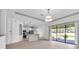 Open floor plan kitchen with stainless steel appliances and lots of natural light at 13303 Swiftwater Way, Lakewood Ranch, FL 34211