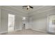 Spacious main bedroom with wood flooring and a view of the en suite bathroom and walk-in closet at 13303 Swiftwater Way, Lakewood Ranch, FL 34211
