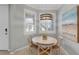 Cozy breakfast nook with corner windows and stylish pendant lighting at 13816 Messina Loop # 104, Bradenton, FL 34211