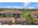 Stunning condo building featuring a golf course view and private garages at 13816 Messina Loop # 104, Bradenton, FL 34211