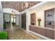 An inviting lobby with a unique brick ceiling, decorative cabinets and contemporary finishes at 13816 Messina Loop # 104, Bradenton, FL 34211