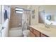 Bathroom features a bathtub with shower, vanity with a sink, and tile at 20170 Benissimo Dr, Venice, FL 34293