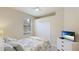Comfortable bedroom featuring soft lighting, neutral colors, and a relaxing ambiance at 20170 Benissimo Dr, Venice, FL 34293