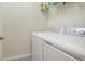 Functional laundry room with modern appliances and ample space at 20170 Benissimo Dr, Venice, FL 34293