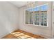 Bright bedroom with hardwood floors and a large window with views of neighboring building at 210 N 17Th W St # 12, Bradenton, FL 34205