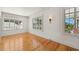 Spacious living room featuring hardwood floors, natural light, and classic design at 210 N 17Th W St # 12, Bradenton, FL 34205