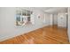 Bright living room featuring hardwood floors and beautiful windows with neighborhood views at 210 N 17Th W St # 12, Bradenton, FL 34205