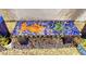 Mosaic bench featuring colorful marine life characters at 310 S Osprey Ave, Sarasota, FL 34236
