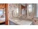 Elegant bathroom featuring floral wallpaper, a marble countertop vanity, and decorative lighting fixtures at 310 S Osprey Ave, Sarasota, FL 34236