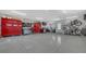 Spacious garage featuring organized storage, a workbench, and ample room for projects and vehicles at 310 S Osprey Ave, Sarasota, FL 34236