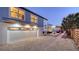 Spacious garage with a multi-car door and gravel driveway offers ample parking and storage solutions at 310 S Osprey Ave, Sarasota, FL 34236