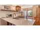 Well-appointed kitchen featuring countertops, stainless steel appliances, and ample cabinet space at 310 S Osprey Ave, Sarasota, FL 34236