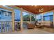 Inviting screened-in porch features a ceiling fan, comfortable seating, and relaxing outdoor views at 310 S Osprey Ave, Sarasota, FL 34236