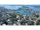 Beautiful aerial view of a coastal home with lush landscaping and stunning water views at 3530 Flores Ave, Sarasota, FL 34239