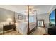 Serene main bedroom featuring a four-poster bed, soft lighting, and a tranquil ambiance at 3530 Flores Ave, Sarasota, FL 34239