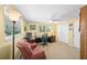 Bright bedroom featuring a home office, neutral carpet, and a ceiling fan at 364 El Greco Dr, Osprey, FL 34229