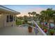 Inviting deck with waterfront views, tropical landscaping, outdoor seating, and a plunge pool at 364 El Greco Dr, Osprey, FL 34229