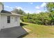 Backyard with patio and manicured lawn at 4528 Fern Dr, Bradenton, FL 34208