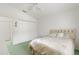 Bedroom featuring a large window, ceiling fan, and closet at 4528 Fern Dr, Bradenton, FL 34208