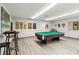 Fun game room with pool table and high-top tables at 4528 Fern Dr, Bradenton, FL 34208