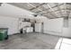 Spacious garage featuring laundry and storage area at 4528 Fern Dr, Bradenton, FL 34208