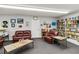 Inviting library with comfortable seating and extensive bookshelves at 4528 Fern Dr, Bradenton, FL 34208