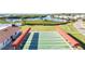 Waterfront shuffleboard courts with beautiful landscaping and recreational amenities at 4528 Fern Dr, Bradenton, FL 34208