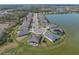 Aerial shot of a residential area surrounding a pond and wetland preserve at 5821 Hevena Ct, Palmetto, FL 34221