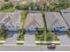 Aerial view of a charming home showcasing an inviting entrance and manicured landscaping at 5821 Hevena Ct, Palmetto, FL 34221