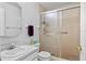 Bathroom with sliding glass shower and tile flooring at 6205 Green View Dr # 129, Sarasota, FL 34231